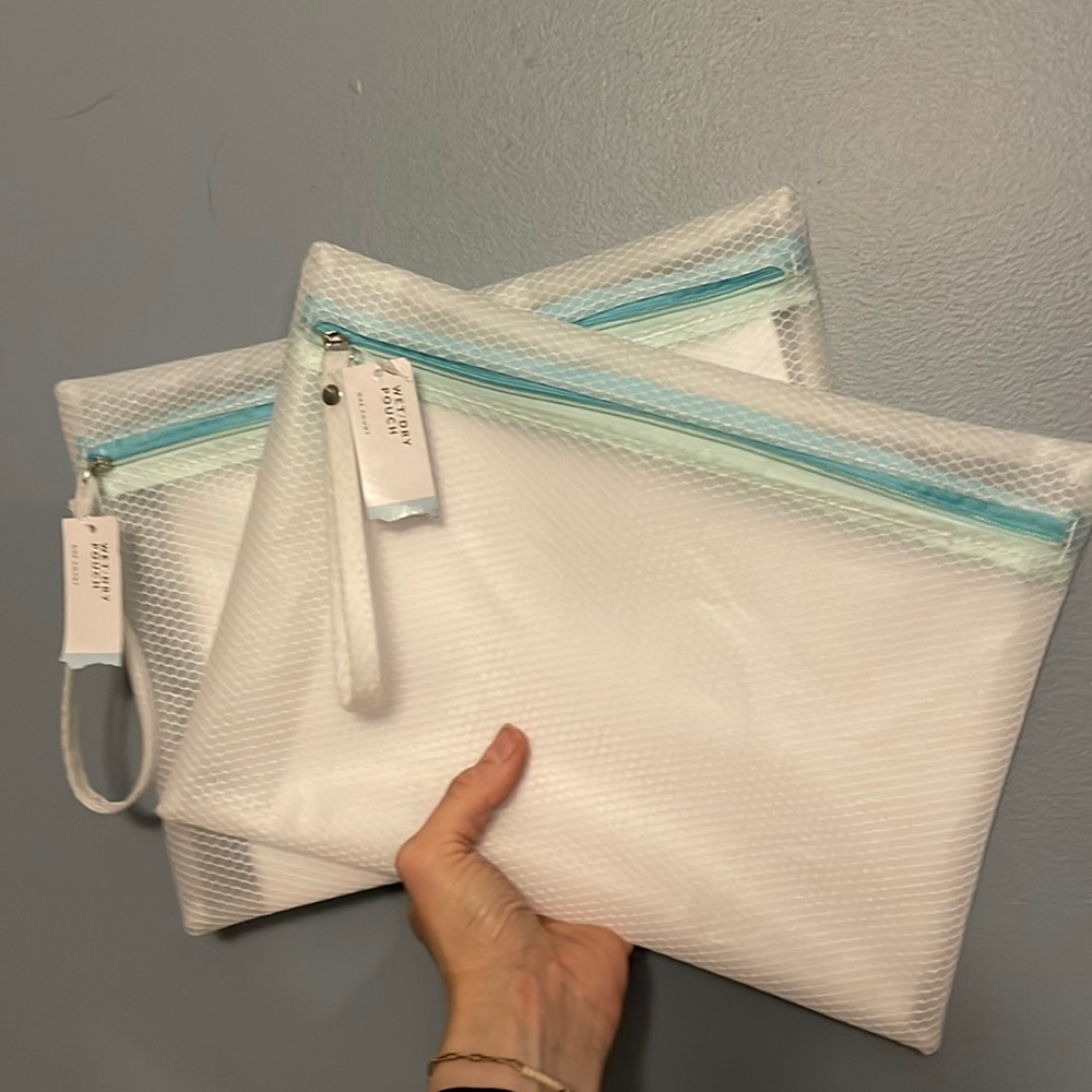 Wet zippered beach/pool pouch